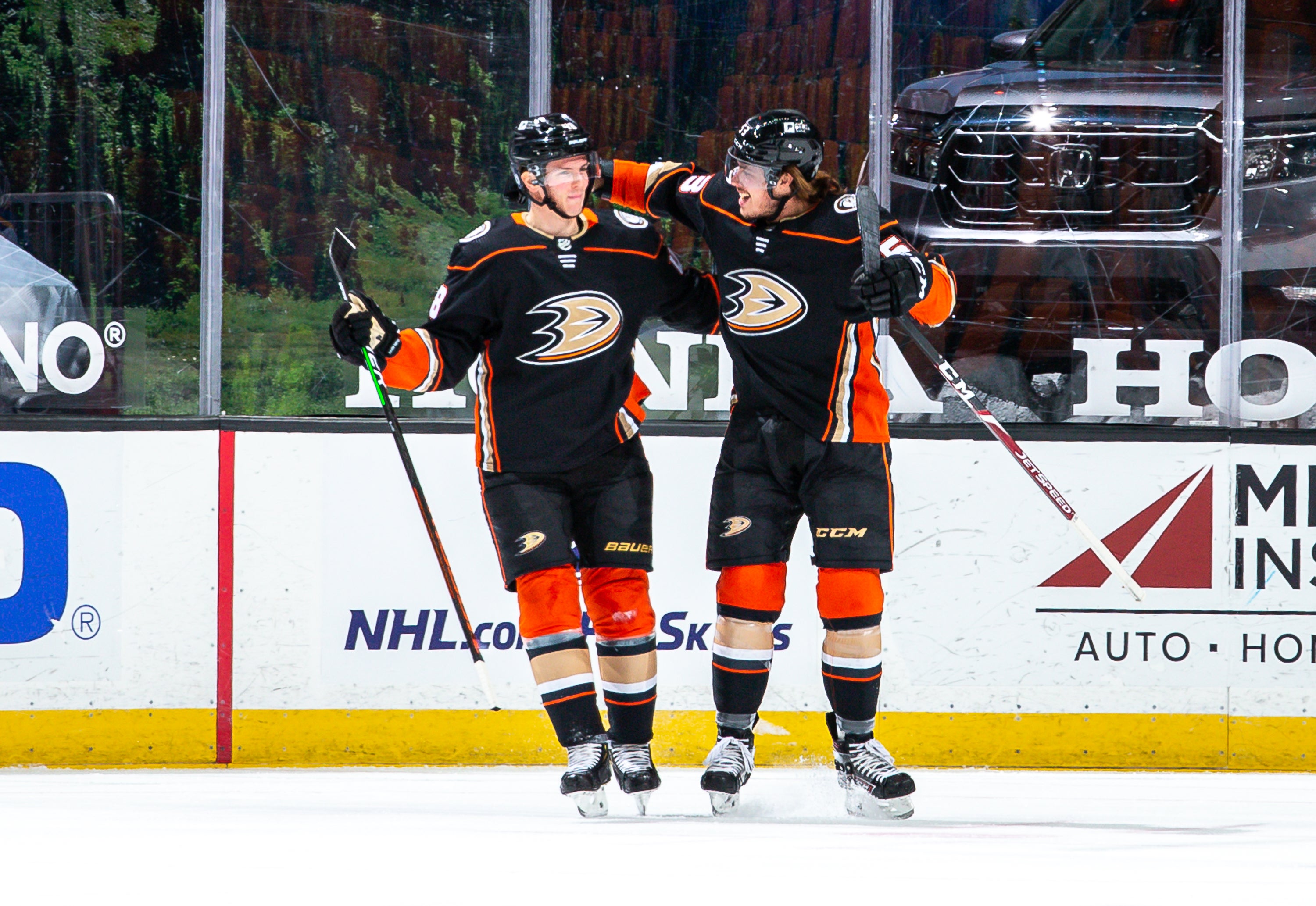 Isac Lundestrom with fellow Gulls Grad, Max Comtois